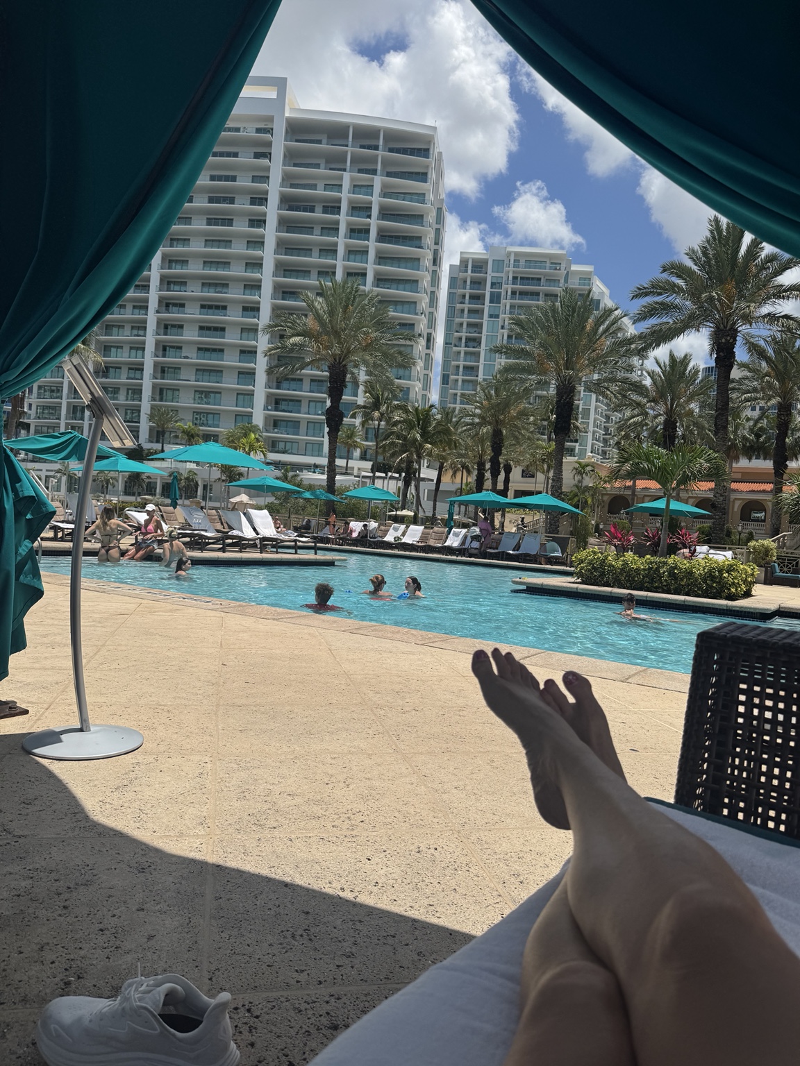 A relaxed view from a private cabana overlooking the pool at The Ritz-Carlton, Sarasota