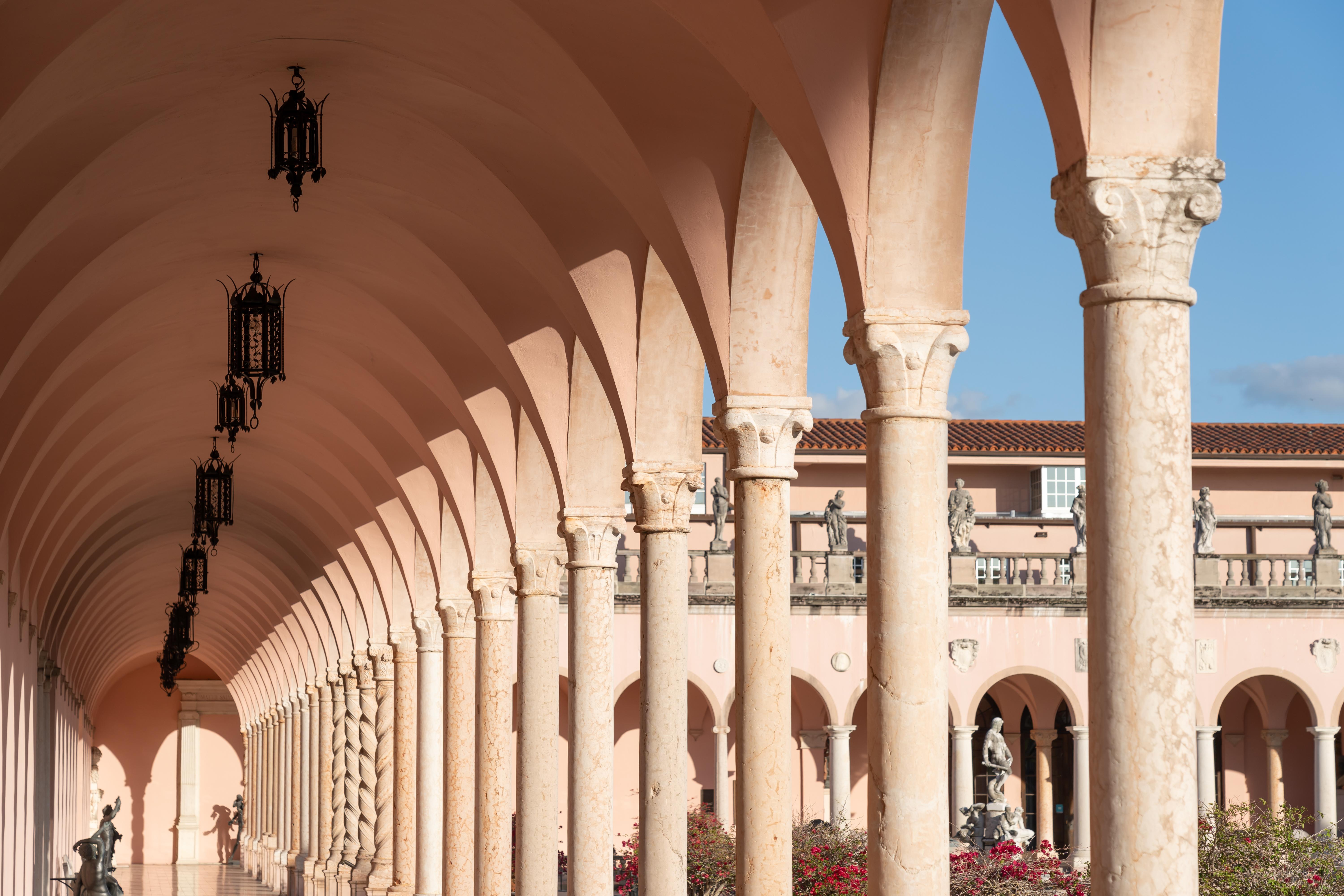Sunlit arches and sculpture courtyard at The Ringling Museum in Sarasota, Florida